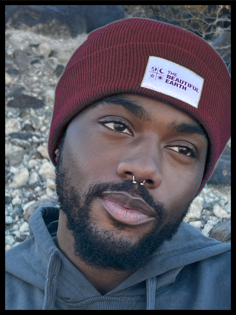 THE YEAR-ROUND BEANIE IN RUBY SUNSET w/ WHITE PATCH ON DOUGLAS THE BEAUTIFUL EARTH | Conscious Clothing Brand + Healthy Essentials